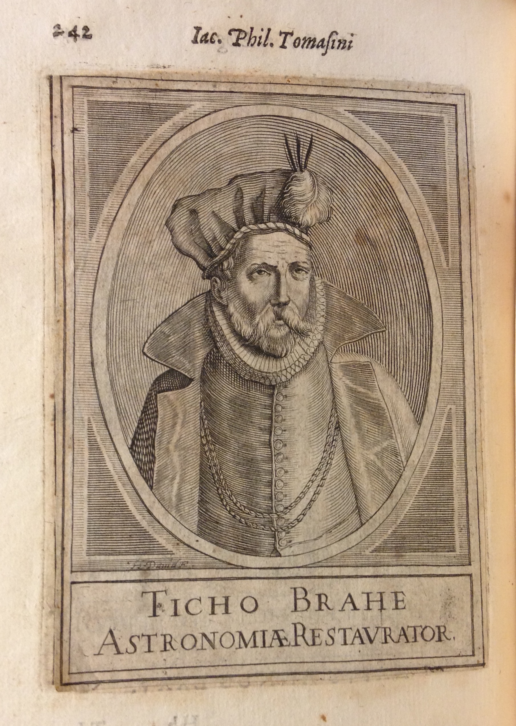 A stellar eclipse! This engraved portrait of astronomer Tycho Brahe is actually a cancel slip pasted over another engraved portrait inadvertently printed on the wrong leaf. Note how the lower left corner is lifting upward, and the engraved border of the underlying portrait visible at left. Giacomo Filippo Tomasini, Illustrium virorum elogia iconibus illustrata (Padua, 1630), p. 242.   (CT1122 .T6 1630)