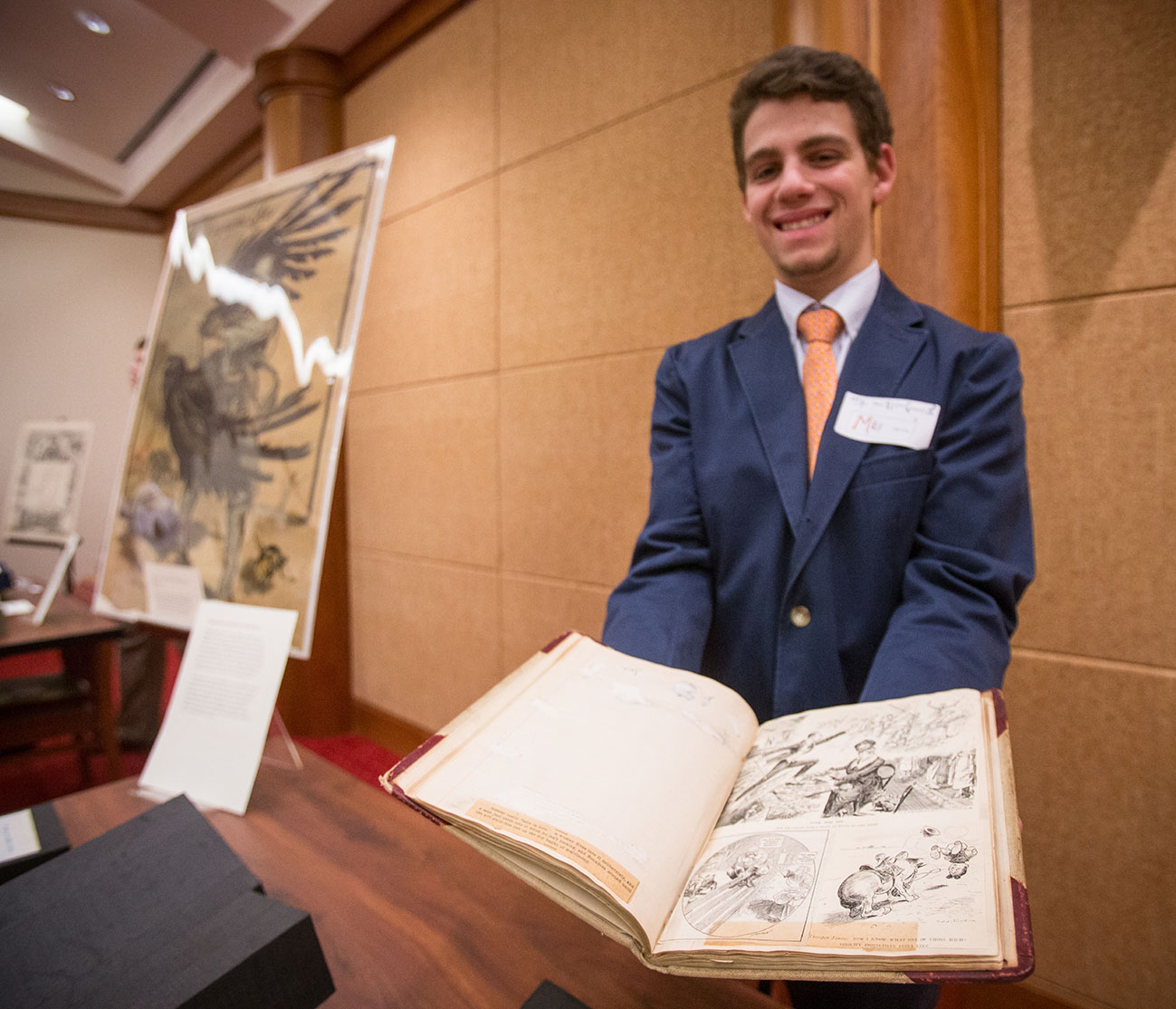 Max Novick presents a WWI era scrapbook, November 18, 2014. (Photograph by Sanjay Suchak) 