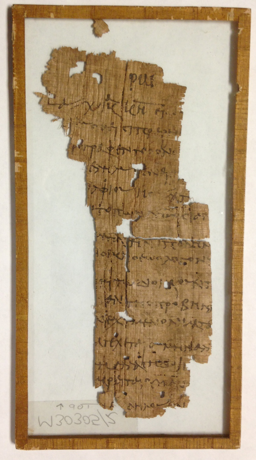 P. Virginia 1, U.Va.'s first papyrus document, measures 16.5 x 8 cm. It was written in Greek, probably in Egypt during the 3rd century CE. Purchased on the Associates Endowment Fund.