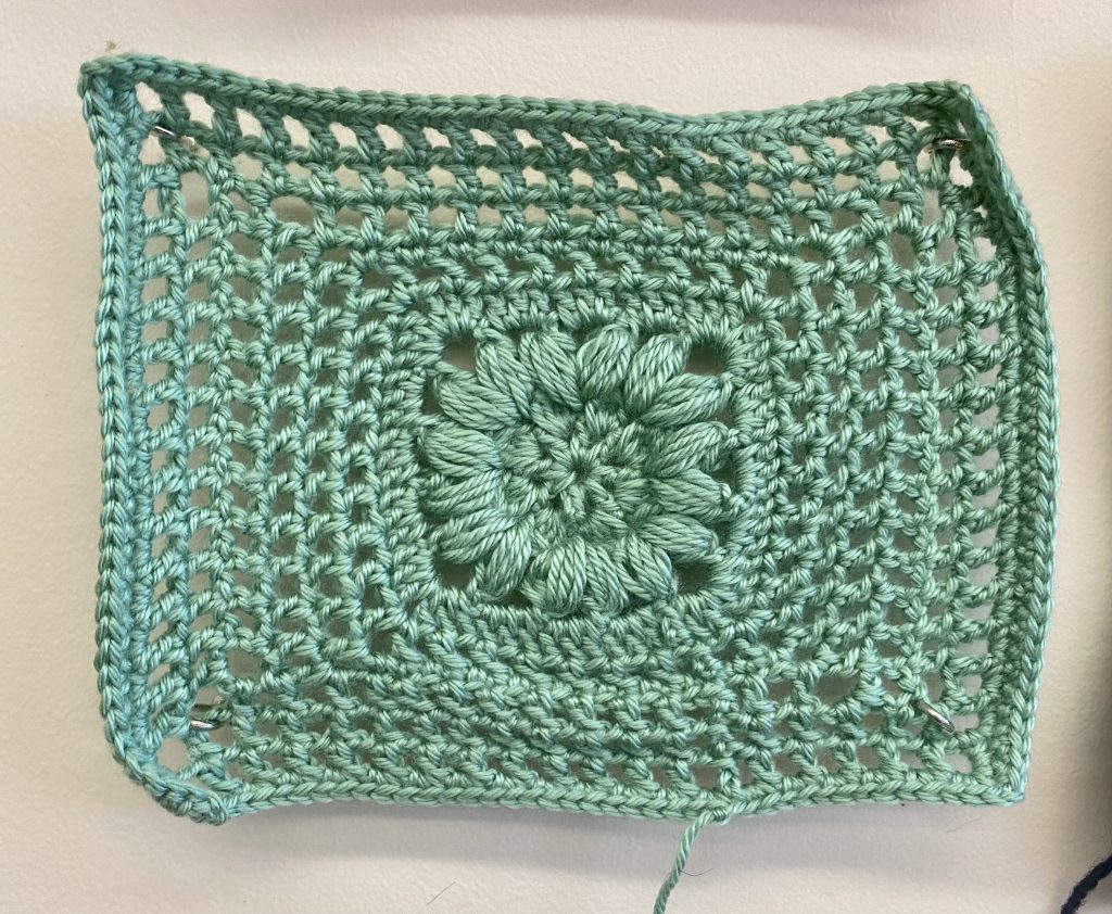 mint green knitted square