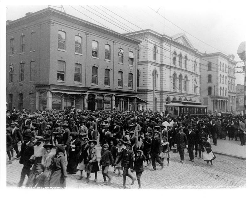 Photograph of Emancipation Day in Richmond, VA April 3, 1905: African Americans walking en masse in street parade