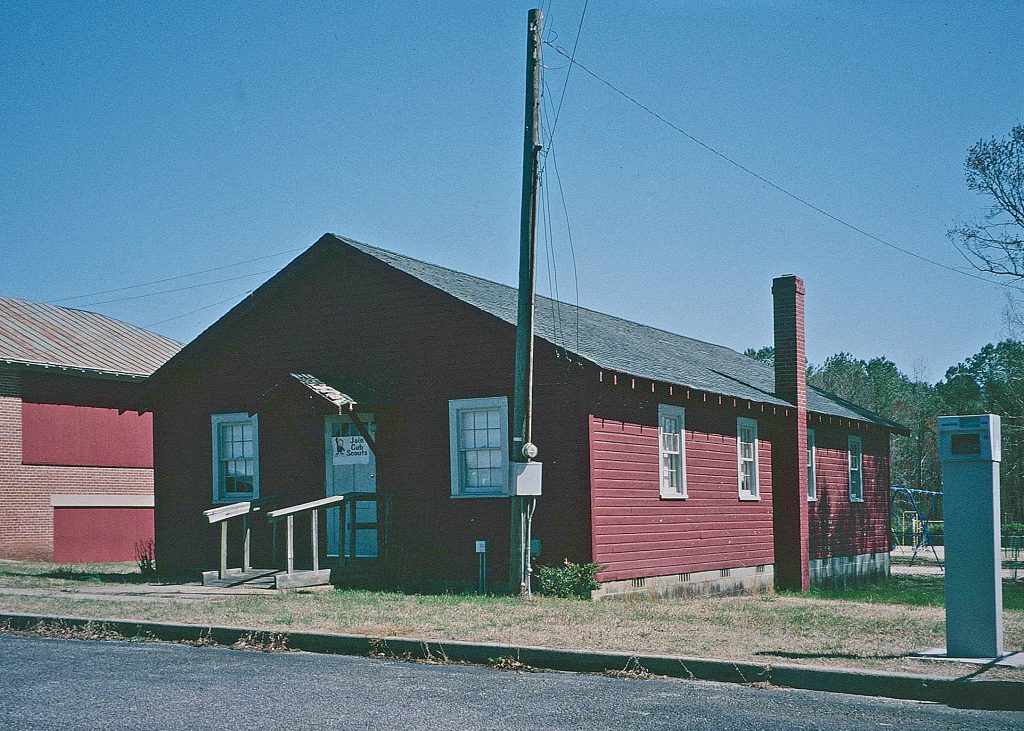 Photograph of red school building